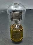 (1) Radiotron Uv 200 Good Bright Filament Brass Base Tipped Glass. Fixed Price $39.99.