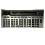 Radioshack TRS-80 Pocket Computer Vintage Portable Calculator Silver Gray Japan. Fixed Price $69.95.