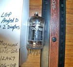 Strong Magnavox By Tung-sol Long Gray Plate Angled Getter 12AX7 / ECC83 Tube. Fixed Price $59.99.